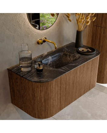 Mondiaz Kurve-Dlux 100cm badmeubel ronding Links + Rechts kleur Walnut met 1 lade en 2 deuren. Wastafel Grunne Midden zonder kraangat Lava.