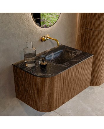 Mondiaz Kurve-Dlux 75cm badmeubel ronding Links kleur Walnut met 1 lade en 1 deur. Wastafel Grunne Rechts zonder kraangat Lava.