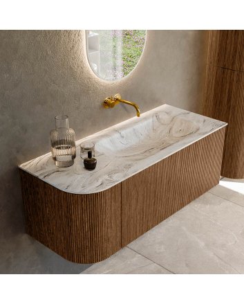 Mondiaz Kurve-Dlux 115cm badmeubel ronding Links kleur Walnut met 1 lade en 1 deur. Wastafel Big small Rechts zonder kraangat Glace.