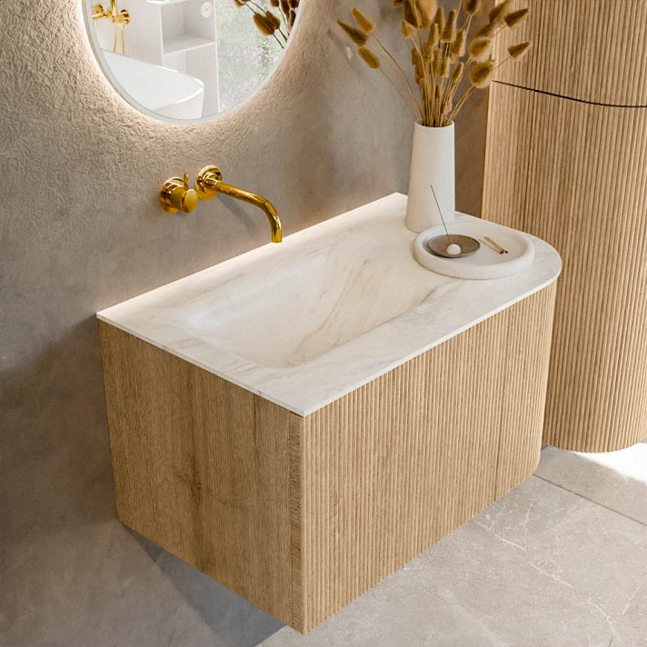 Mondiaz Kurve-Dlux 75cm badmeubel ronding Rechts kleur Oak met 1 lade en 1 deur. Wastafel Grunne Links zonder kraangat Ostra.