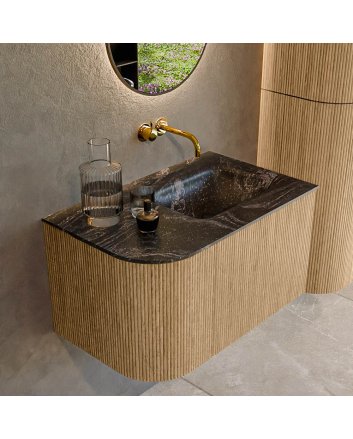 Mondiaz Kurve-Dlux 75cm badmeubel ronding Links kleur Oak met 1 lade en 1 deur. Wastafel Grunne Rechts zonder kraangat Lava.