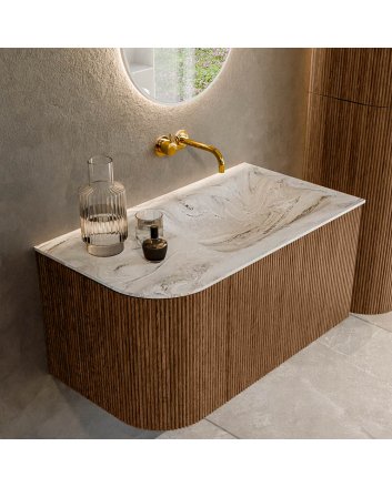 Mondiaz Kurve-Dlux 85cm badmeubel ronding Links kleur Walnut met 1 lade en 1 deur. Wastafel Cloud Rechts zonder kraangat Glace.