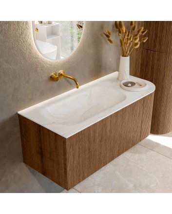 Mondiaz Kurve-Dlux 105cm badmeubel ronding Rechts kleur Walnut met 1 lade en 1 deur. Wastafel Big small Links zonder kraangat Ostra.