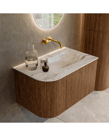 Mondiaz Kurve-Dlux 75cm badmeubel ronding Links kleur Walnut met 1 lade en 1 deur. Wastafel Grunne Rechts zonder kraangat Glace.