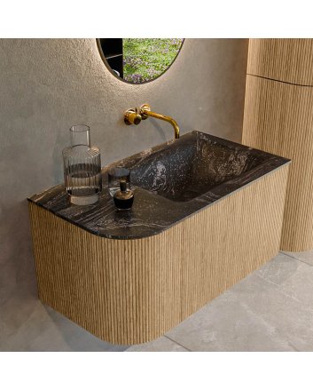 Mondiaz Kurve-Dlux 85cm badmeubel ronding Links kleur Oak met 1 lade en 1 deur. Wastafel Cloud Rechts zonder kraangat Lava.
