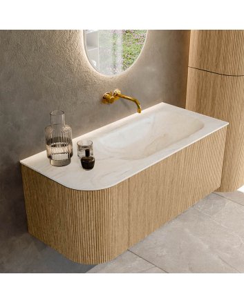 Mondiaz Kurve-Dlux 105cm badmeubel ronding Links kleur Oak met 1 lade en 1 deur. Wastafel Big small Rechts zonder kraangat Ostra.